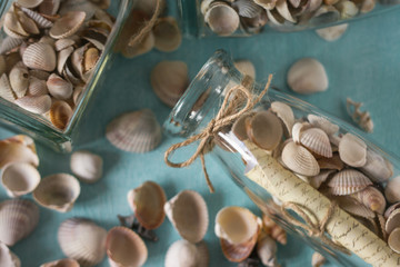 Bottle with a message, seashells. Marine concept.