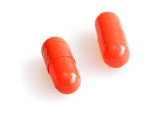 Two capsules isolated on white background