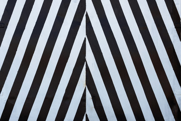 Black and white striped gate