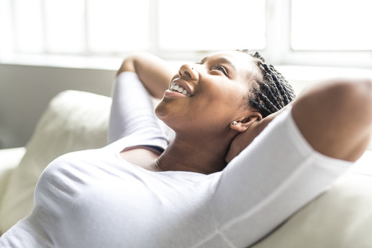 Teen African Young Woman Relaxing At Home