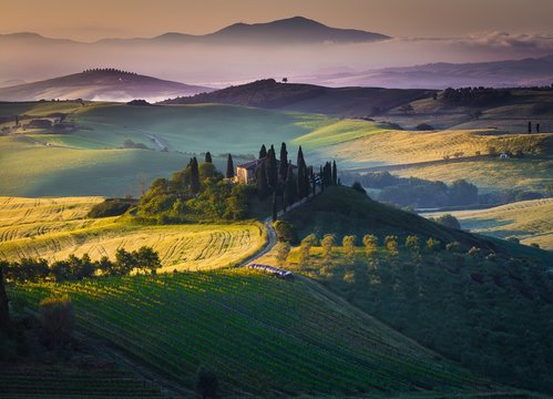 Farmhouse and field at San Quirico d Orcia during dawn