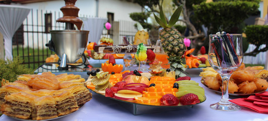 catering banquet table, Buffet with snacks at the outdoor event