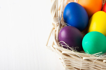 Colored Easter eggs in a basket