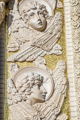 Bas-reliefs with images of angels on the facade of the Naval Cathedral in Kronstadt
