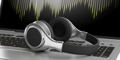 Headphones on a laptop. 3d illustration