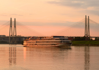 Obraz premium Cable-stayed bridge at sunset.