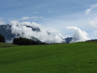 clouds gras alps hills green sky woods