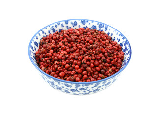 Pink peppercorns in a china bowl