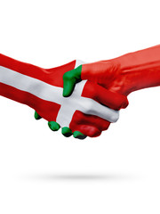 Flags Denmark, Portugal countries, partnership friendship handshake concept.