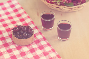 Homemade liqueur made from black currants and red gooseberry.