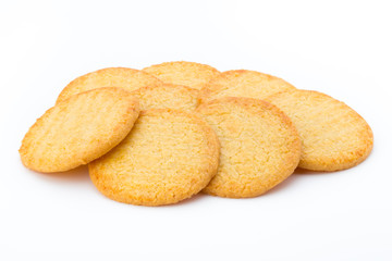 Stacked short pastry cookies isolated on white background.