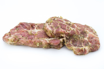 Pork chop, marinated. Isolated on the white background.