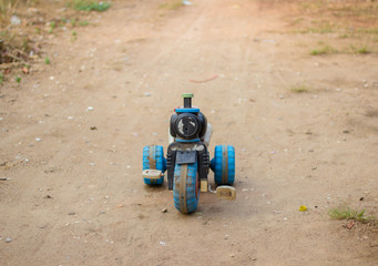 Old motorcycle toy,broken toy  with copy space