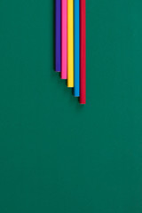 Pastel, Blue, Pink, Yellow, Blue, Red on green background