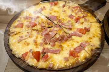 Home made pizza cheese and ham.