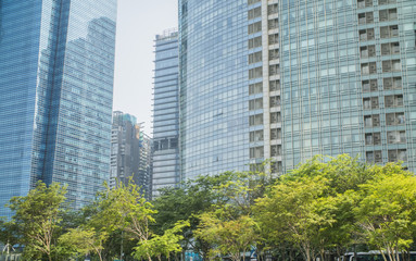 Obraz premium Business Modern architecture close up, texture windows of a high rise building