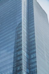 Business Modern architecture close up, texture windows of a high rise building