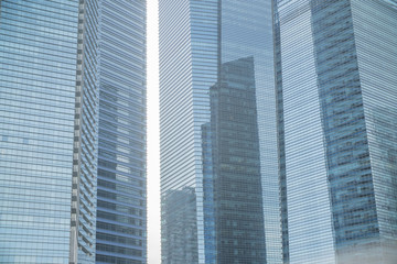 Business Modern architecture close up, texture windows of a high rise building