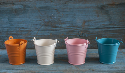 empty colorful buckets