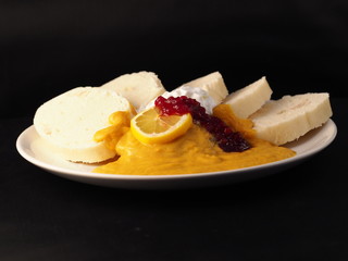 Roast sirloin in sour cream sauce with dumplings, traditional czech food.