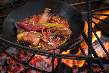 preparation of chicken meat at the stake