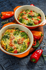 Frittata with broccoli in two ceramic forms