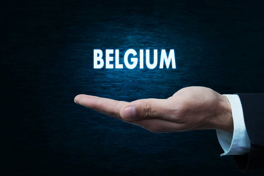 Hand holding Belgium word