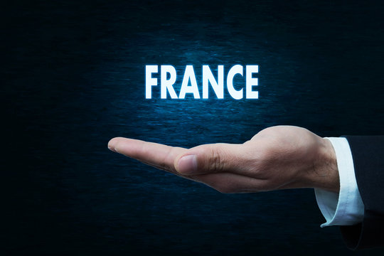 Hand with France word