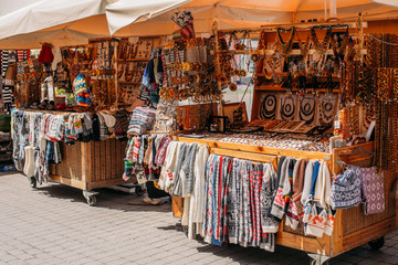 Riga, Latvia. Street Market In Livu Square. Trading Houses With  - obrazy, fototapety, plakaty