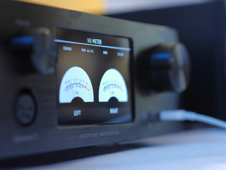 Hifi headphone amplifier with volume pocentyometrem decibels. - obrazy, fototapety, plakaty