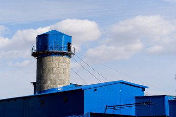 A water tower blue color in City.
