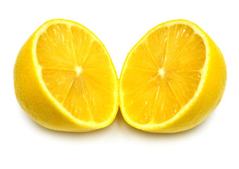 The cut lemon isolated on white background. Tropical fruit. Flat lay, top view