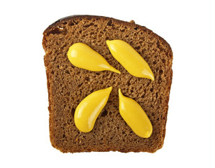 Rye bread slice and mustard isolated on white background