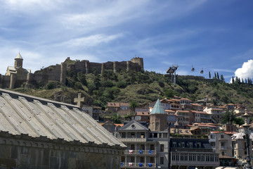 Fototapeta na wymiar View of the center of Tbilisi and the fortress on the hill