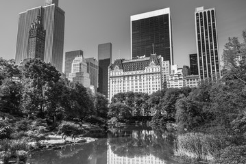 New York skyscrapers reflecting in the Central Park pond, black and white