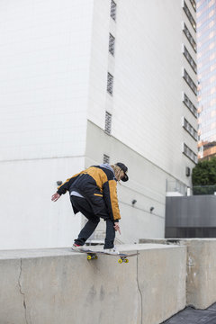 Young man skateboarding.
