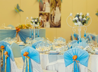the banquet hall with a blue and orange decor