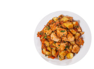 meat stew with potatoes, pepper, onion and carrot. top view. isolated on white