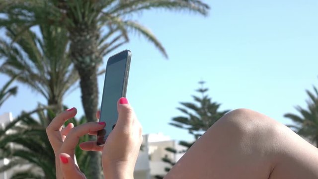 High quality video of woman using mobile phone in 4K