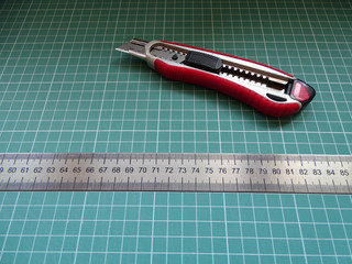 Typographic tools: knife and ruler