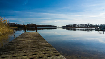 calm lake with landing stage landscape