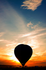 Balloon at sunset
