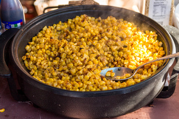 Cooking corn kernels.