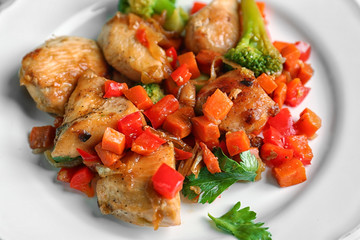 Chicken stir fry on plate, closeup