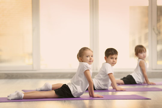 Group of children doing gymnastic exercises