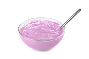 Tasty yogurt in bowl with spoon on white background
