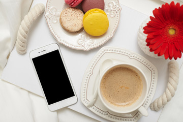 Top view of telephone with coffee