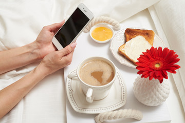 Top view of service tray with light breakfast