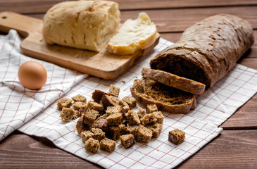 bakery concept with homemade bread on rustic background