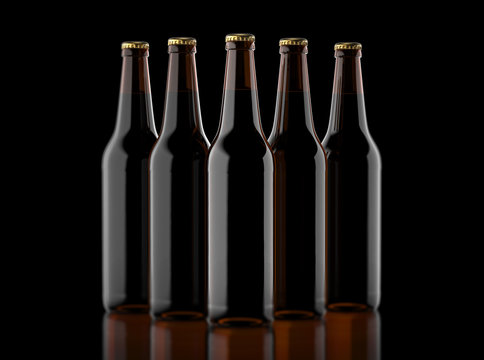 Closeup pin of brown beer bottles. 
